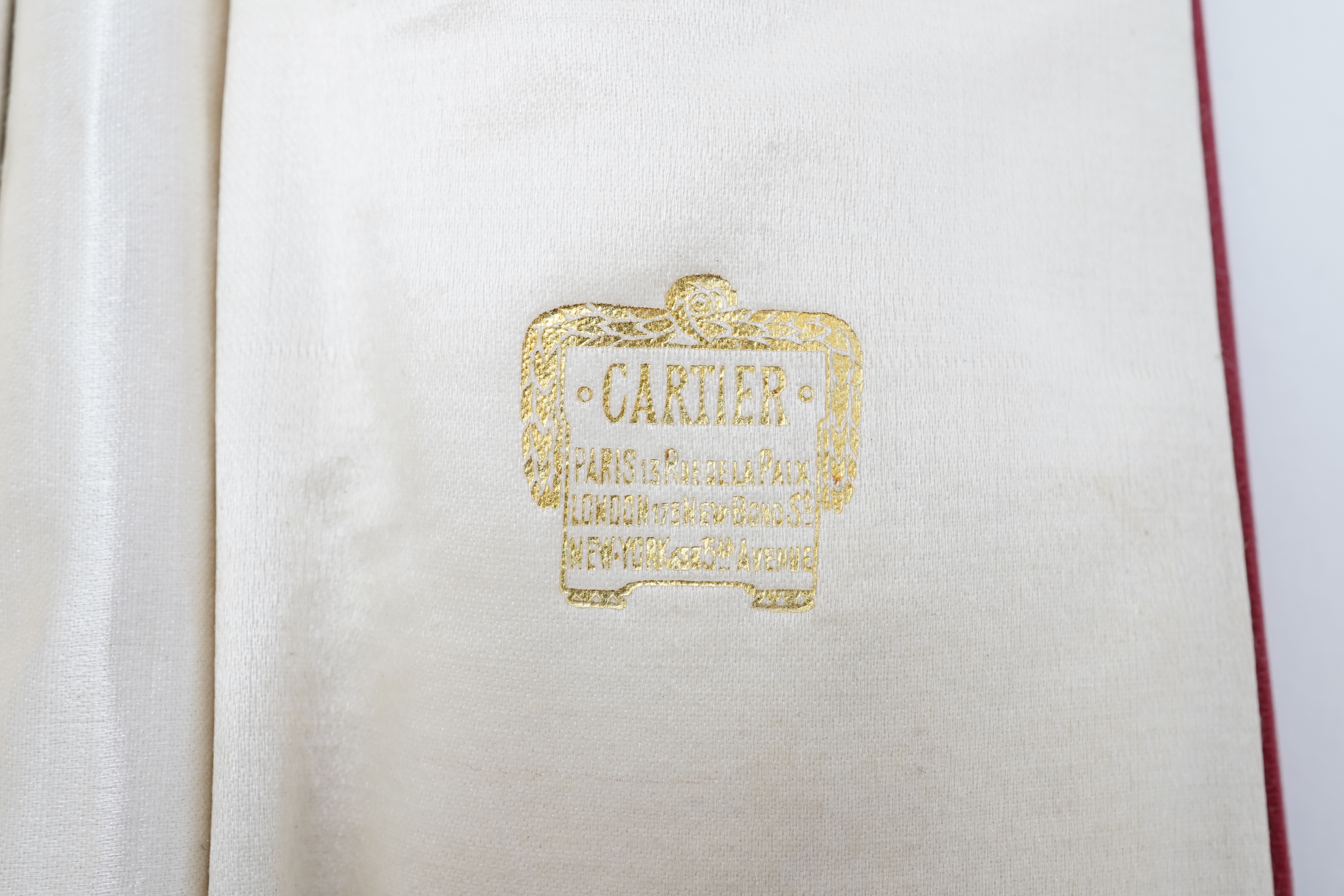 Possibly retailed by Cartier, a pair of Chinese jadeite figures, early 20th century